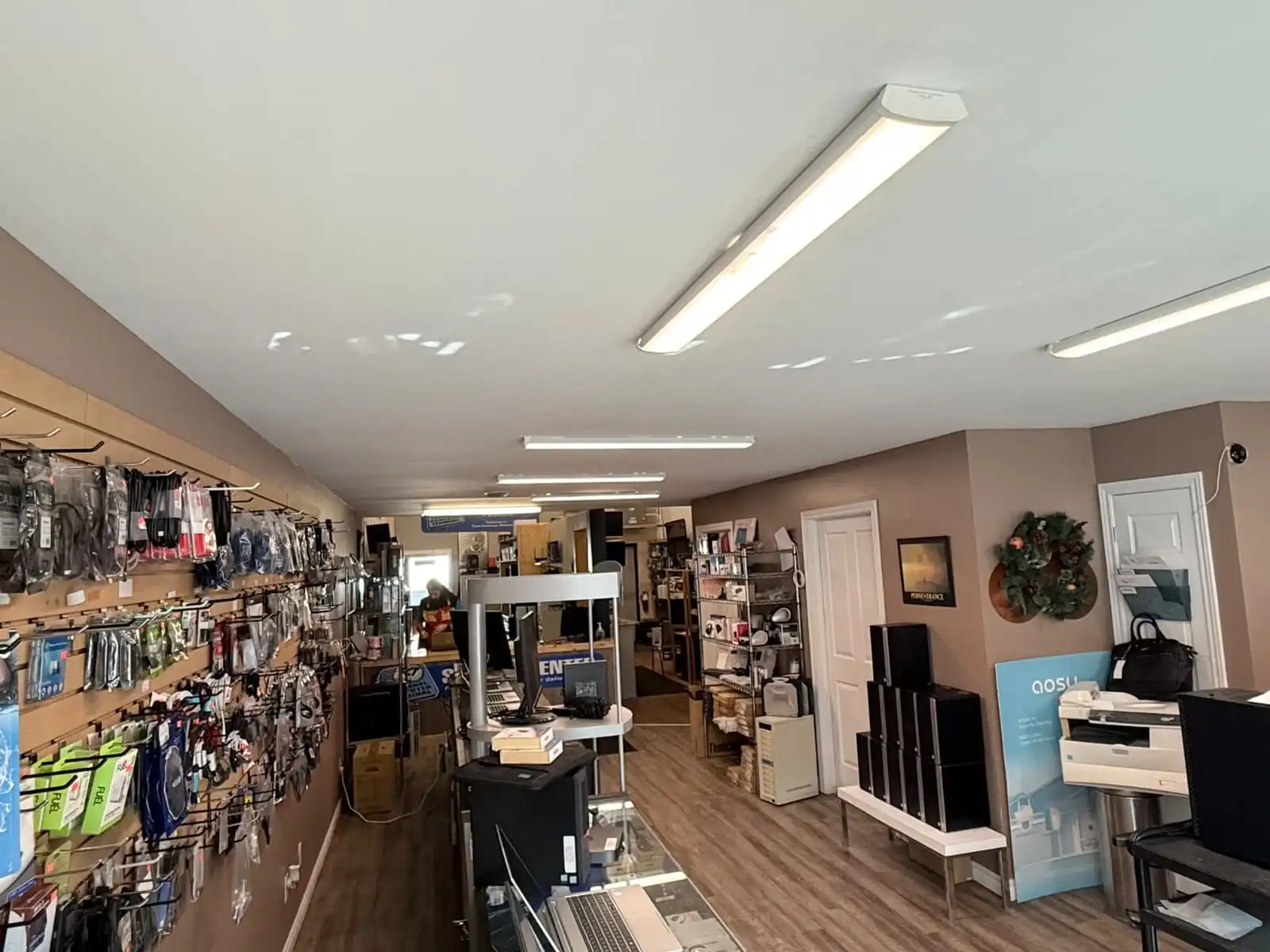 PCT Brantford shop interior with custom PC builds and refurbished computers